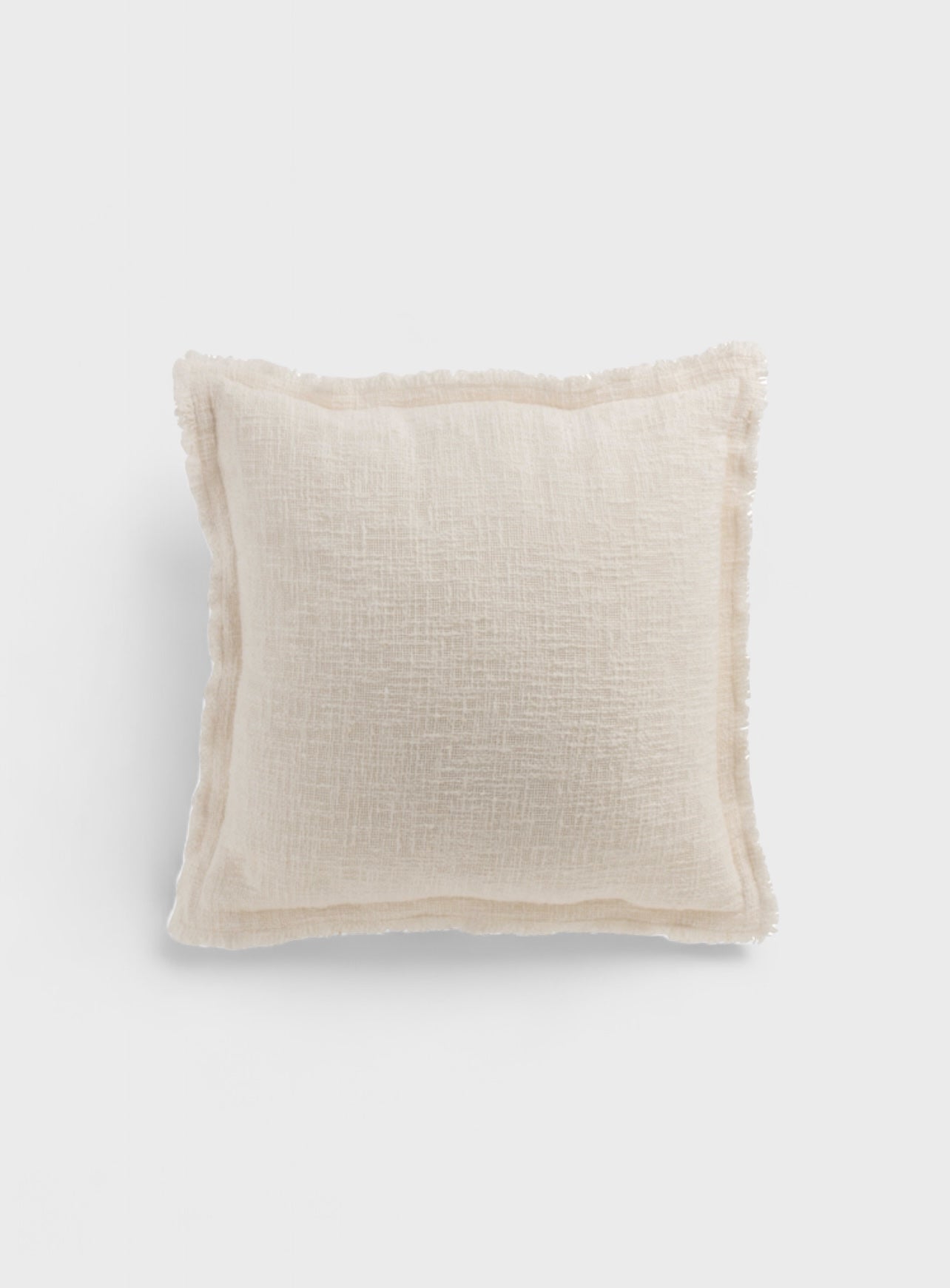 Coussin en coton blanc